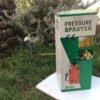 Pressure sprayer on grass background